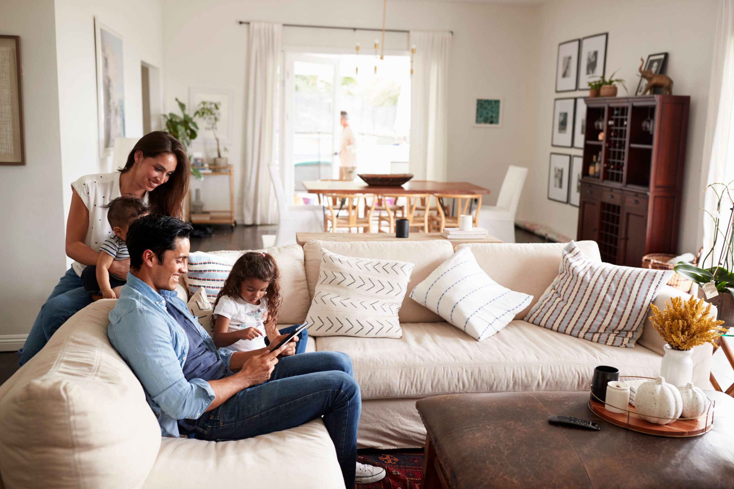 Family in living room at home