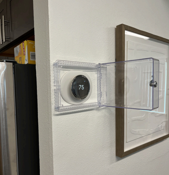 After picture of thermostat inside unit of Huron Plaza Apartments